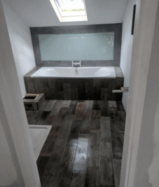 Rustic plank bathroom tiles